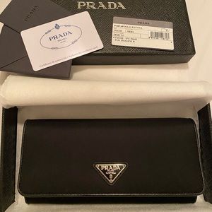 Authentic Prada Wallet Black Tessuto Nylon Canvas and Silver hardware.